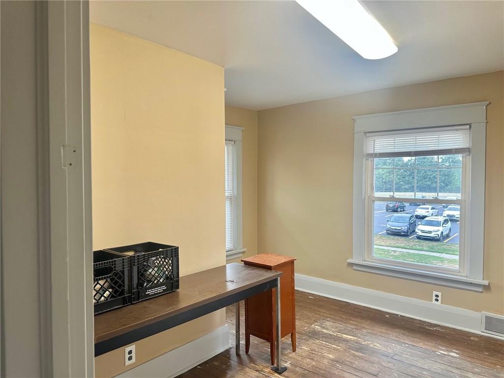 320 Reis Street New Castle, PA 16101 - Photo 12 of 18 a view of room with window and wooden floor