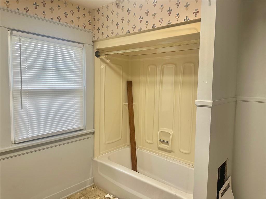 320 Reis Street New Castle, PA 16101 - Photo 17 of 18 a bathroom with a glass shower door