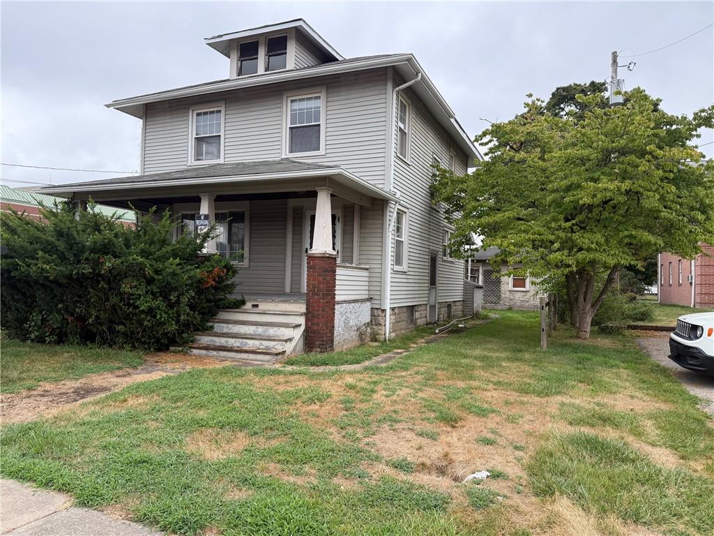 320 Reis Street New Castle, PA 16101 - Photo 2 of 18 a view of a house with a yard and sitting area