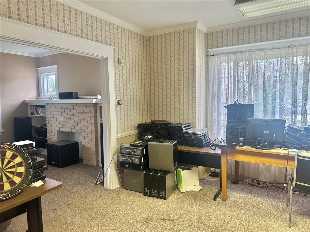 320 Reis Street New Castle, PA 16101 - Photo 10 of 18 a living room with furniture and a fireplace