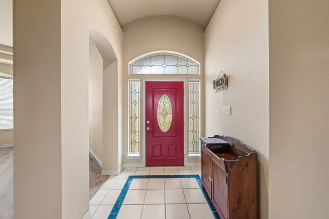 a view of front door with red door