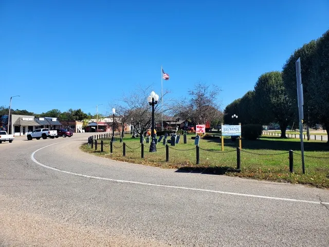 a childrens park with lots of swings and slides