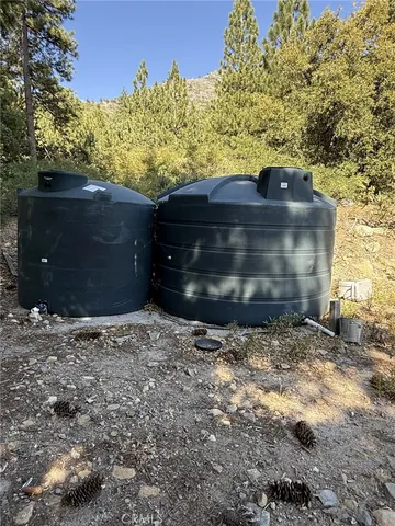 a view of a wooden door and a yard