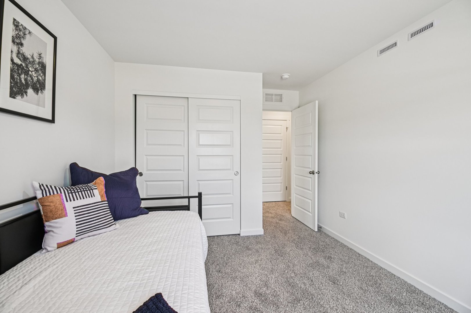2461 Semillon Street Oswego, IL 60543 - Photo 32 of 45 a bedroom with a bed and walk in closet
