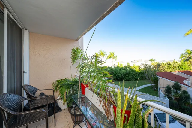 a bed room with a bed and a dresser