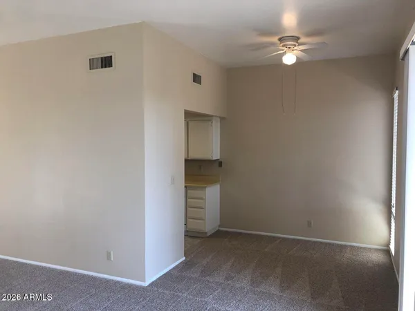 a kitchen with stainless steel appliances granite countertop a sink and a stove