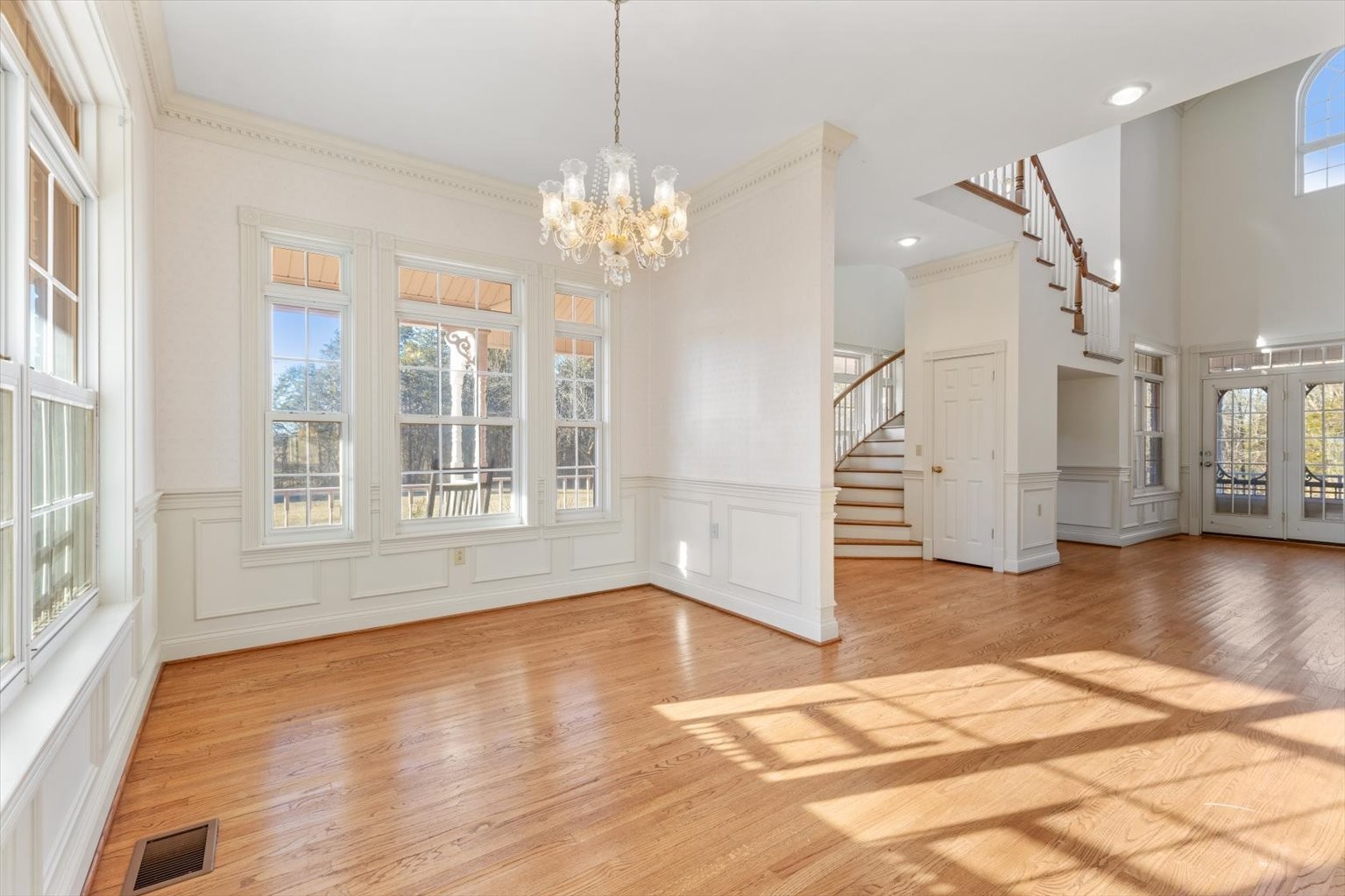3160 Tom Holt Road Clifton, TN 38425 - Photo 12 of 53 a view of an room with wooden floor and large windows