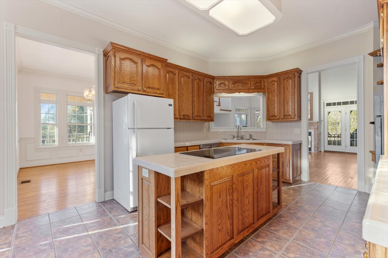 3160 Tom Holt Road Clifton, TN 38425 - Photo 15 of 53 a kitchen with a stove a refrigerator and a oven