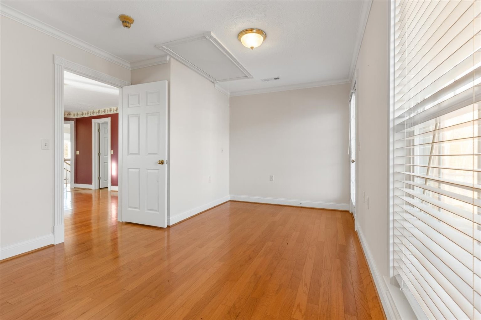 3160 Tom Holt Road Clifton, TN 38425 - Photo 27 of 53 a view of a room with wooden floor and window