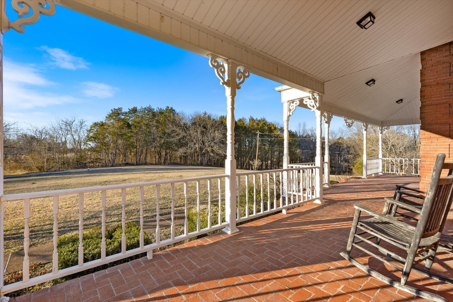 3160 Tom Holt Road Clifton, TN 38425 - Photo 40 of 53 a view of a balcony with mountain view and wooden floor