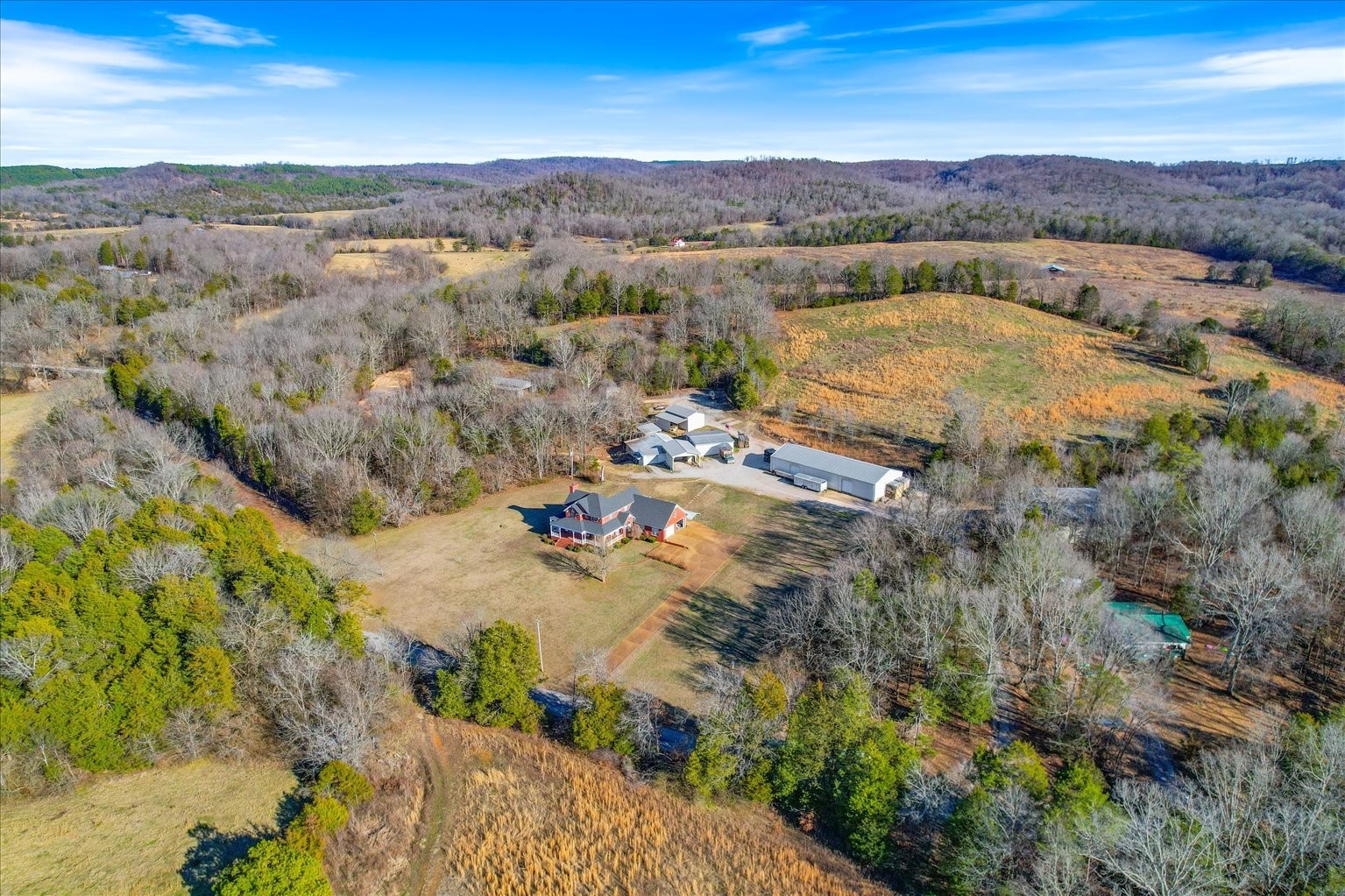 3160 Tom Holt Road Clifton, TN 38425 - Photo 44 of 53 an aerial view of residential houses with outdoor space