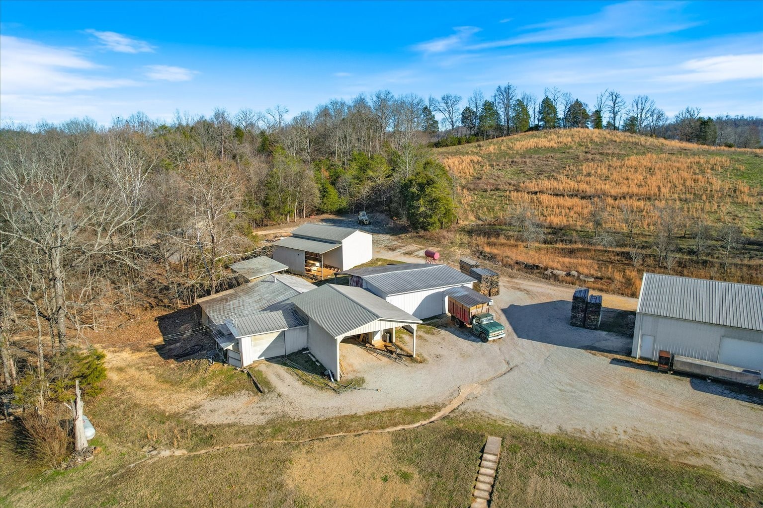 3160 Tom Holt Road Clifton, TN 38425 - Photo 46 of 53 a view of a terrace with a garden and mountain view