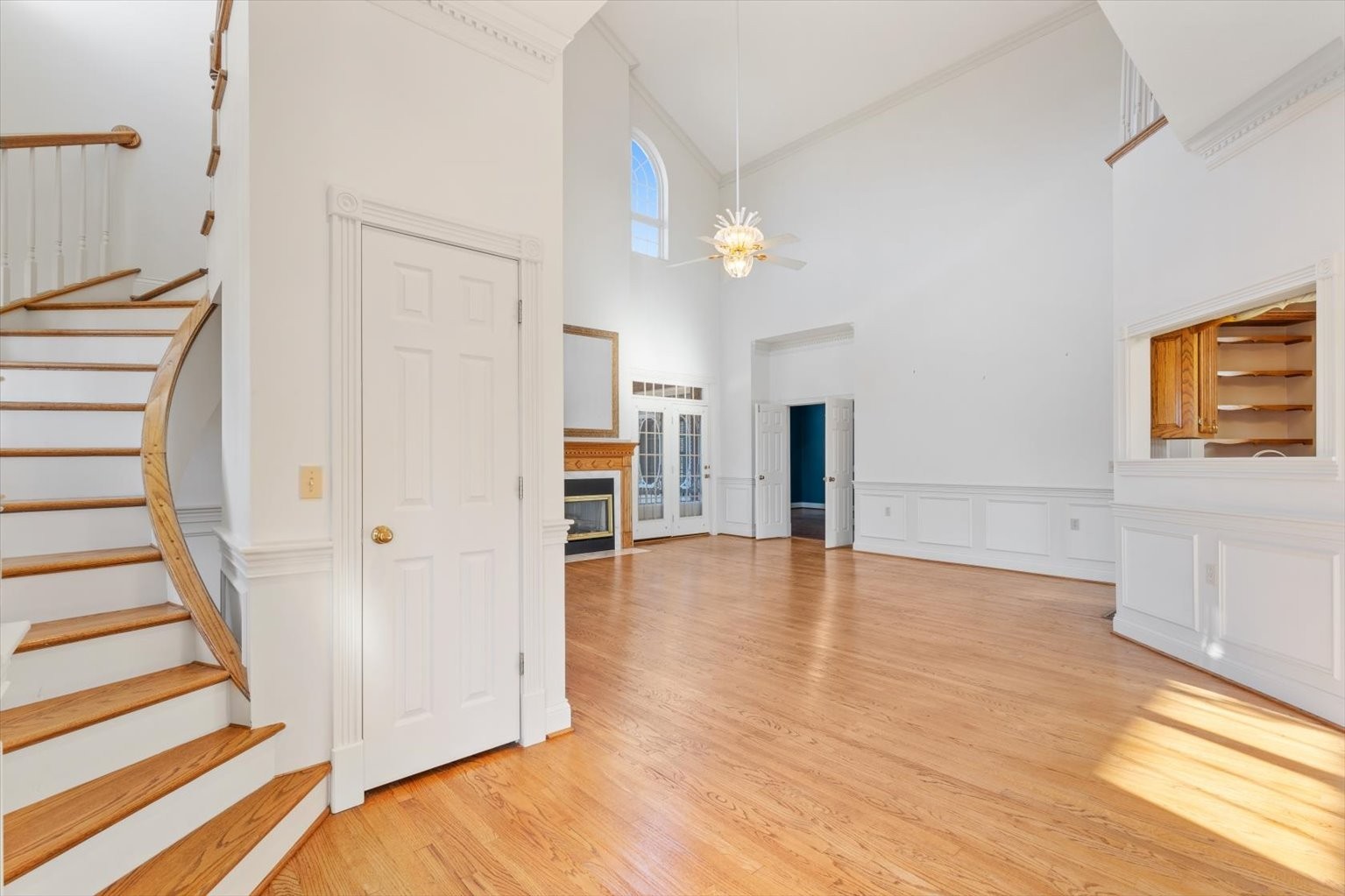 3160 Tom Holt Road Clifton, TN 38425 - Photo 8 of 53 a view of a livingroom with wooden floor and stairs