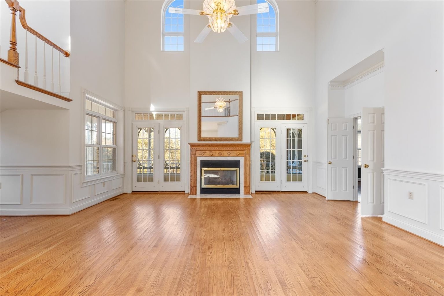 3160 Tom Holt Road Clifton, TN 38425 - Photo 9 of 53 a view of an empty room with glass door and wooden floor