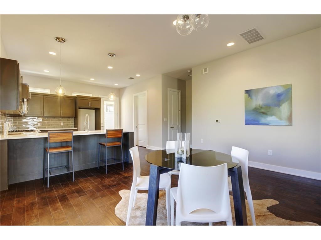 7217 Blessing Avenue, Unit A Austin, TX 78752 - Photo 8 of 22 10' ceilings, hardwood floors, custom kitchen, designer lighting.