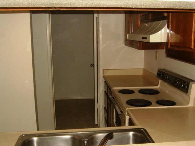 4221 East Almeria Road, Unit 11 Phoenix, AZ 85008 - Photo 3 of 6 Kitchen. Utility room behind.