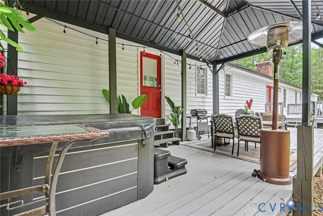 9820 Beaver Bridge Road Chesterfield, VA 23838 - Photo 44 of 54 Expansive outdoor decking featuring a covered pati