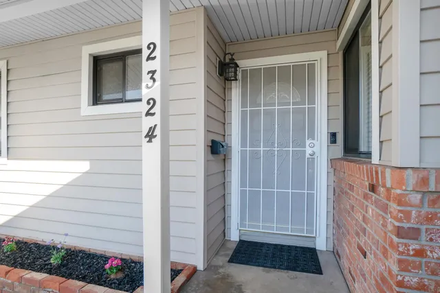 a view of front door and porch