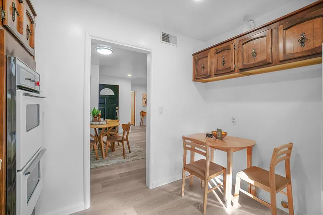 a view of a dining room with furniture