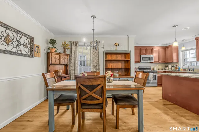 a view of a dining room with furniture