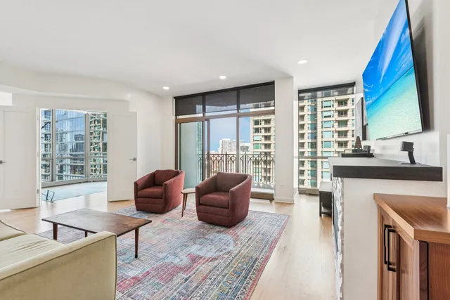 a living room with furniture and a window