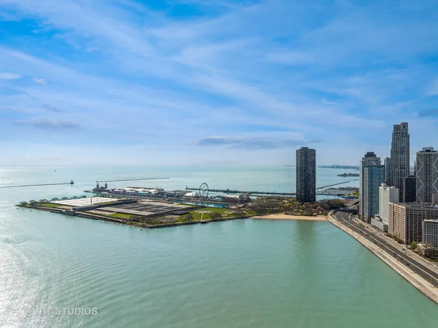 a balcony with an outdoor seating