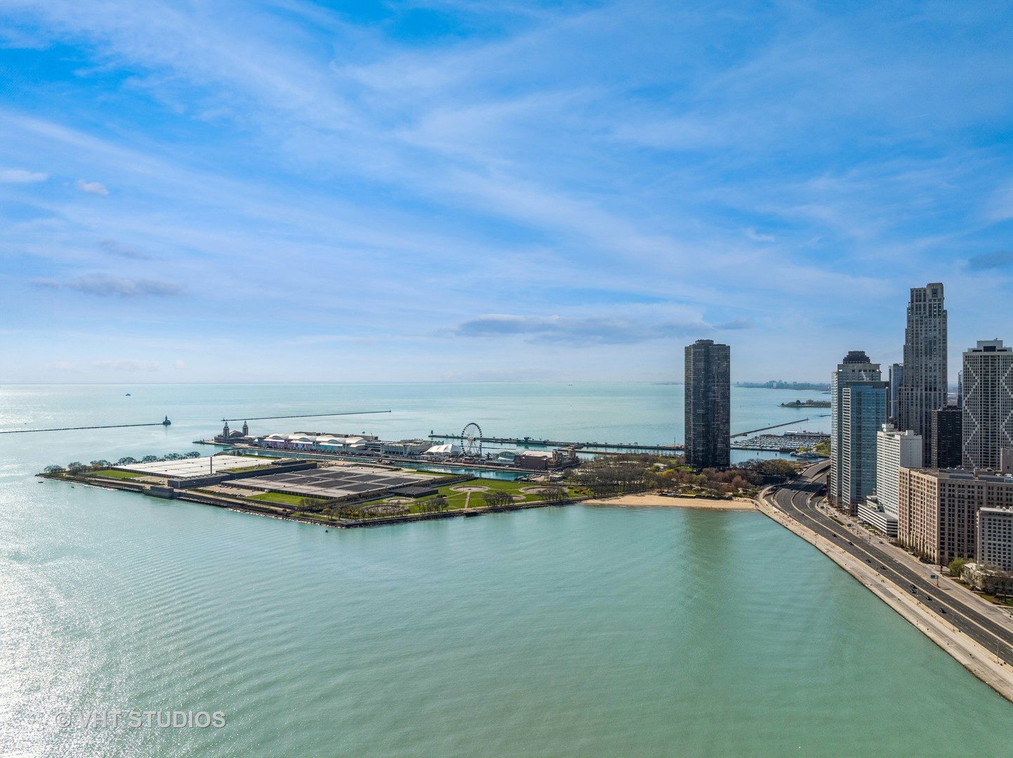 21 East Huron Street, Unit 1806 Chicago, IL 60611 - Photo 44 of 54 a view of a water with an oven and sitting area