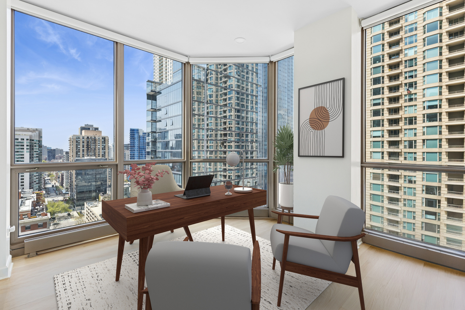 21 East Huron Street, Unit 1806 Chicago, IL 60611 - Photo 8 of 54 a view of a workspace with furniture and a window