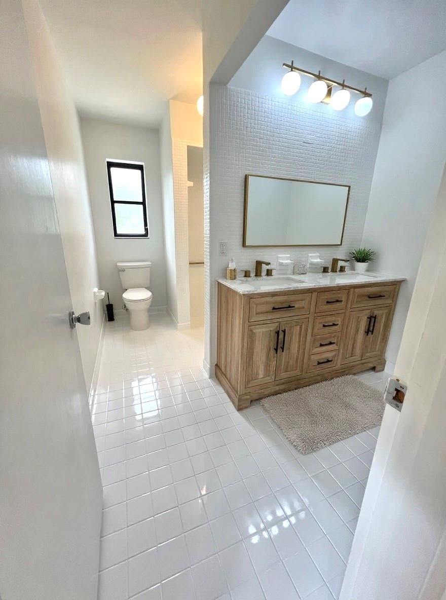 4408 Monroe Street Hollywood, FL 33021 - Photo 13 of 26 a view of a kitchen with stove and cabinets