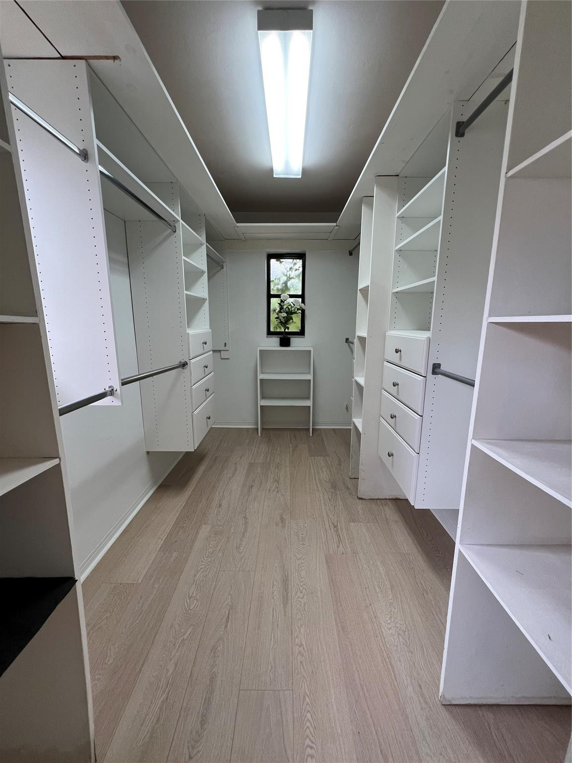 4408 Monroe Street Hollywood, FL 33021 - Photo 14 of 26 a view of walk in closet with empty racks