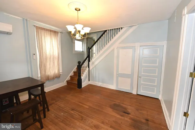a view of entryway with wooden floor