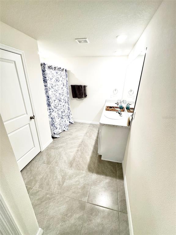 13374 Mylion Way Spring Hill, FL 34610 - Photo 19 of 39 a room with storage and utility