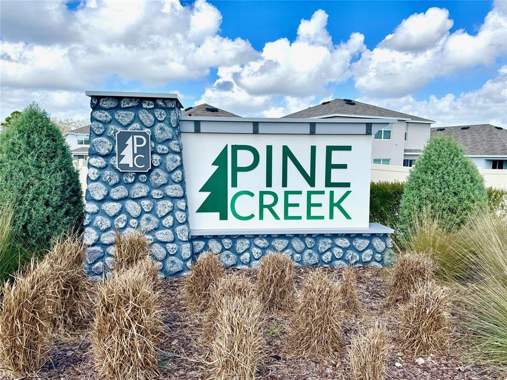13374 Mylion Way Spring Hill, FL 34610 - Photo 2 of 39 a sign on the side of a building