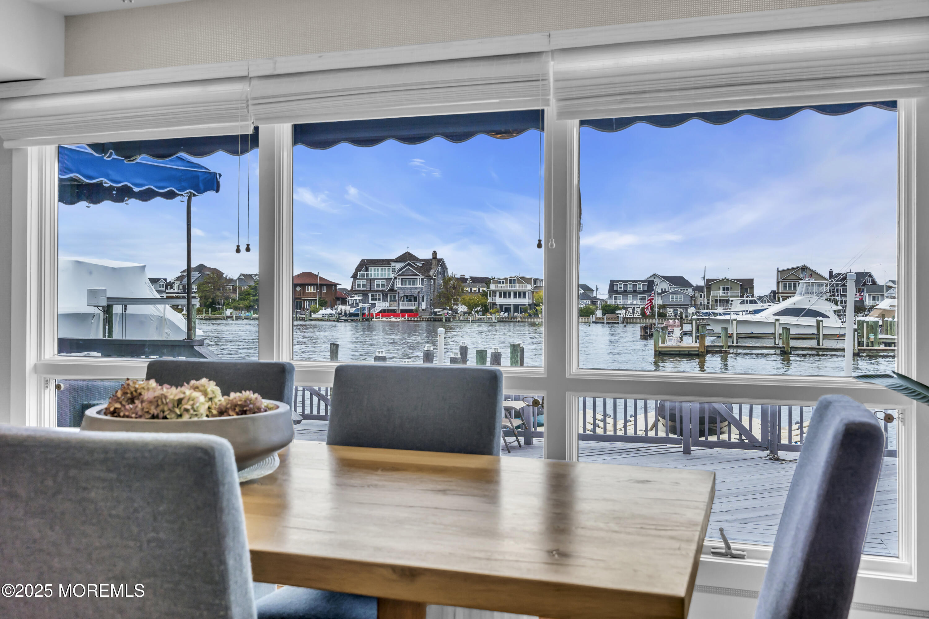 254 Harbor Court Lavallette, NJ 08735 - Photo 14 of 47 a living room with furniture and a large window