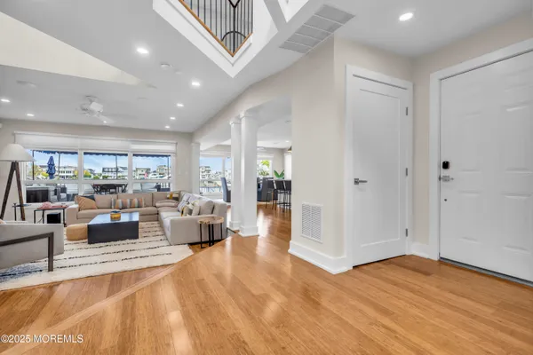 a view of a living room and hardwood floor