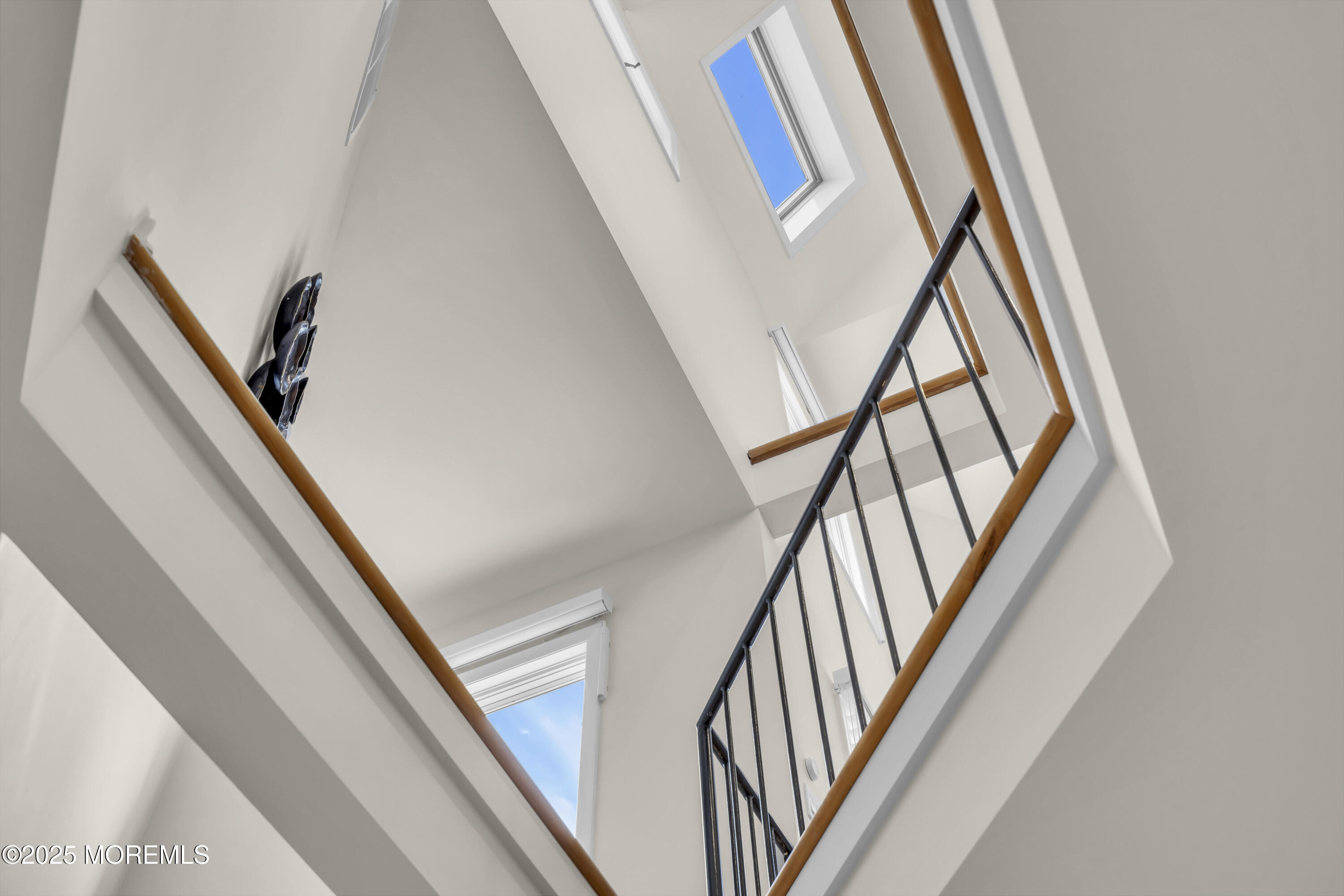 254 Harbor Court Lavallette, NJ 08735 - Photo 19 of 47 a view of staircase with railing and white walls