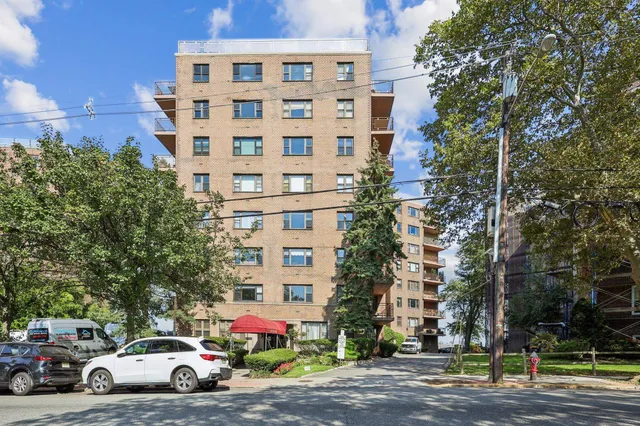 a view of a cars parked in front of a building