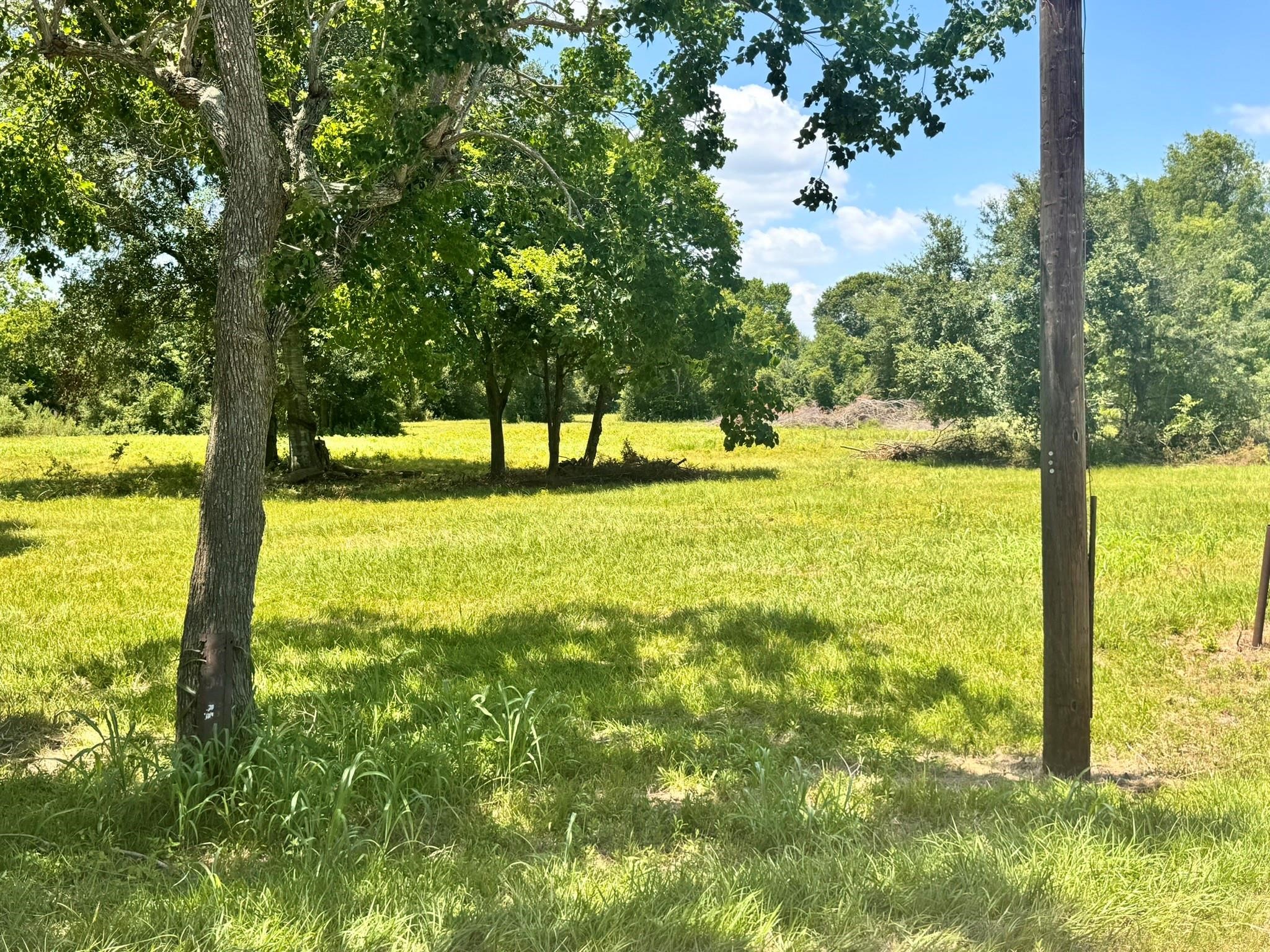 5355 County Road 418 Manvel, TX 77583 - Photo 10 of 12 a view of an ocean from a yard