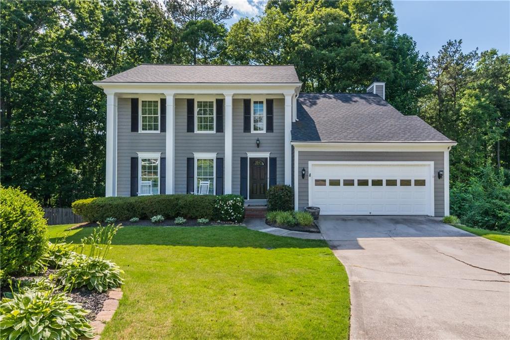 205 Thatching Lane Alpharetta, GA 30022 - Photo 1 of 1 Front view of home with newer exterior paint