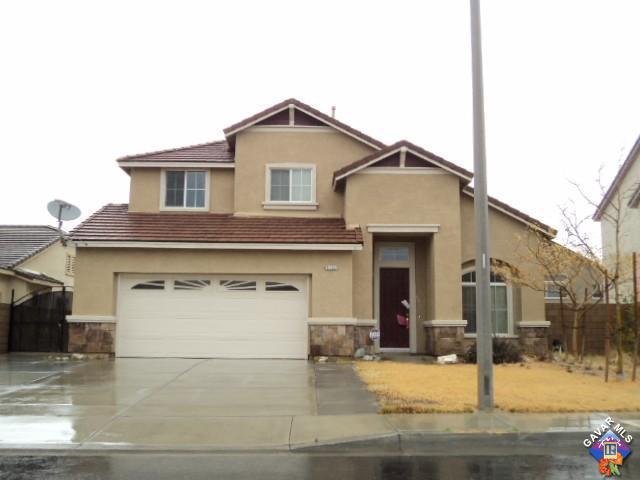5753 Monaco Drive Palmdale, CA 93552 - Photo 1 of 29 a view of a house with garage