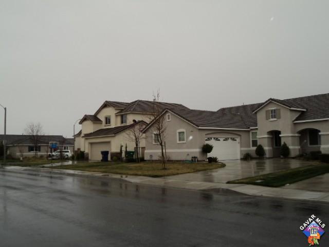 5753 Monaco Drive Palmdale, CA 93552 - Photo 20 of 29 a white house covered with tall trees