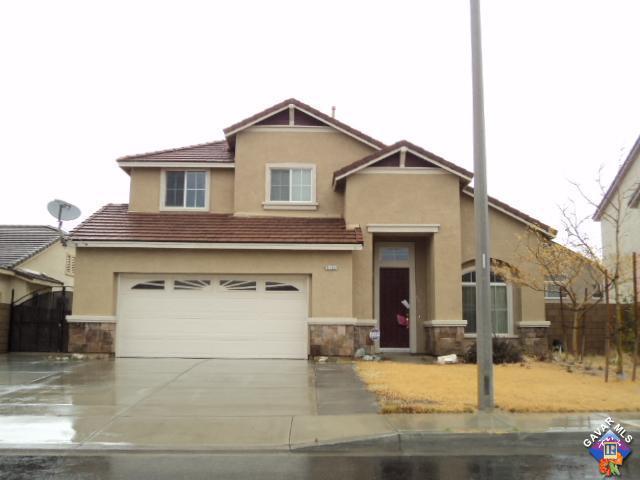 5753 Monaco Drive Palmdale, CA 93552 - Photo 23 of 29 a view of a house with garage