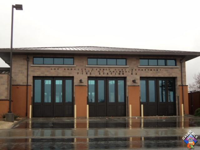 5753 Monaco Drive Palmdale, CA 93552 - Photo 25 of 29 a front view of a building with glass door