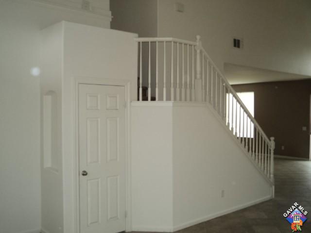 5753 Monaco Drive Palmdale, CA 93552 - Photo 4 of 29 a view of hallway with stairs