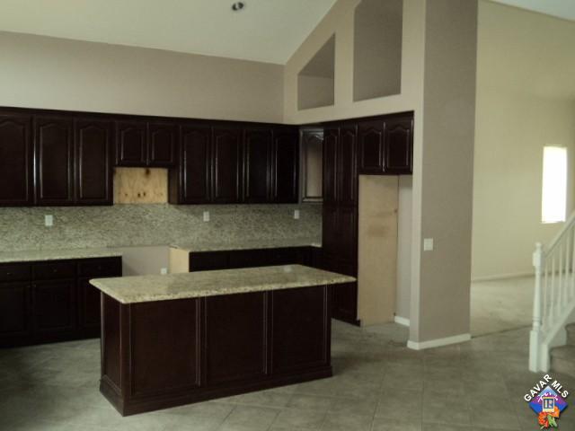5753 Monaco Drive Palmdale, CA 93552 - Photo 8 of 29 a kitchen with cabinets and appliances