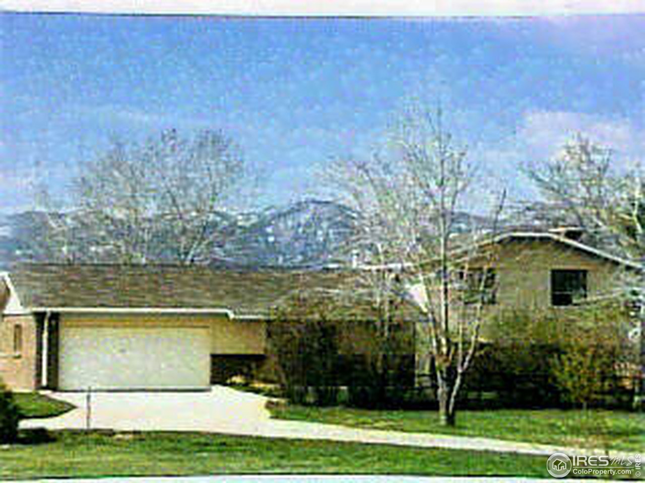 9826 Phillips Road Erie, CO 80026 - Photo 1 of 1 a front view of a house with a yard