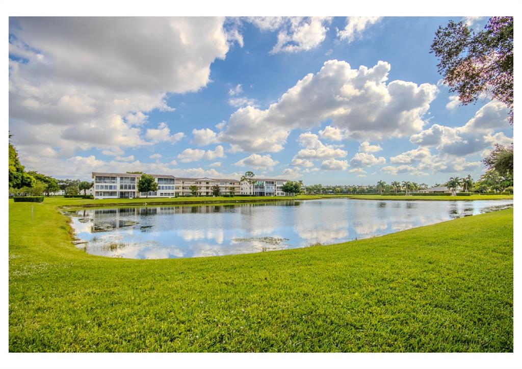 251 Preston F, Unit 251 Boca Raton, FL 33434 - Photo 29 of 35 a view of a lake in a city