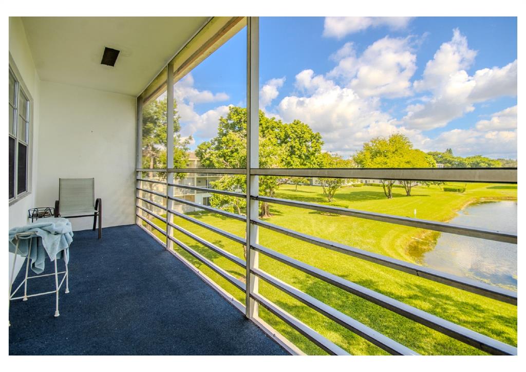 251 Preston F, Unit 251 Boca Raton, FL 33434 - Photo 32 of 35 a view of swimming pool with seating area