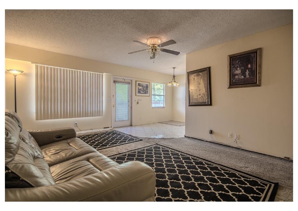 251 Preston F, Unit 251 Boca Raton, FL 33434 - Photo 8 of 35 a bedroom with a bed and a window