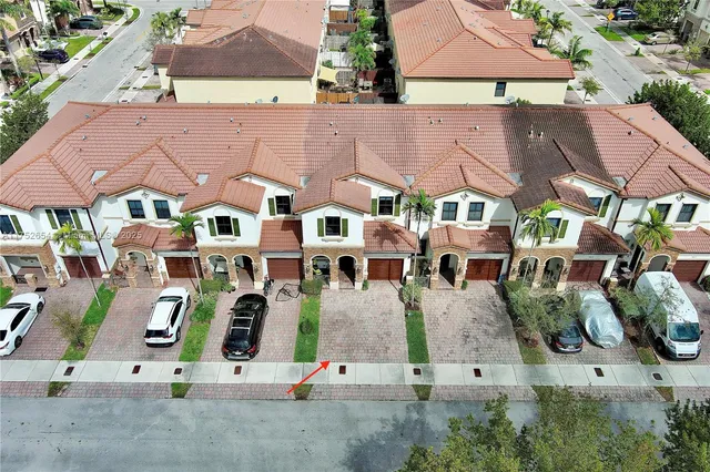 an aerial view of multi story residential apartment building